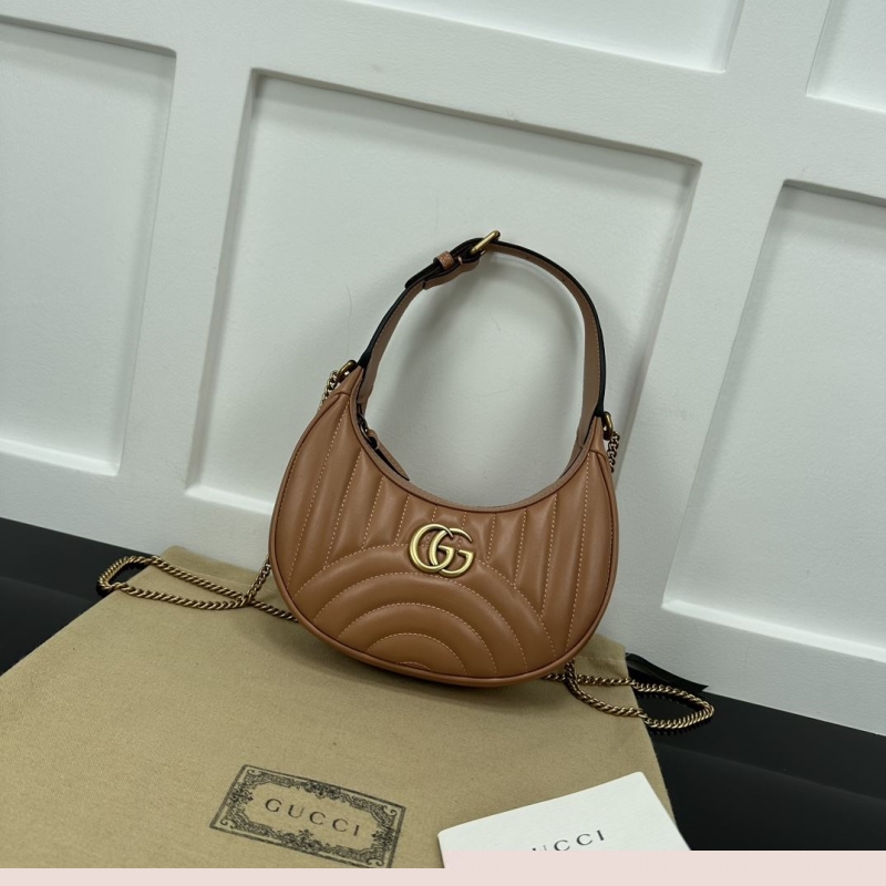 G*u*i top handle bags